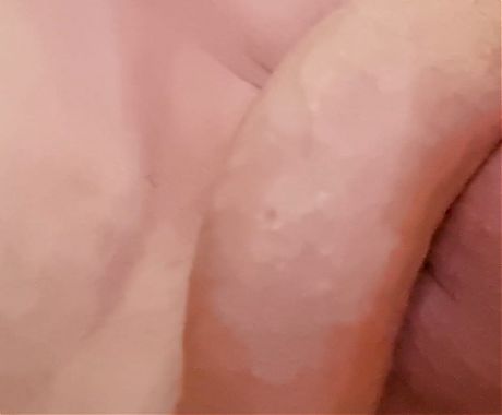 my husband lies and plays with his cock, meaning he rides a dildo
